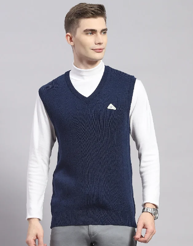 Get ready for your next season with amazing savings on all clothing. Men Blue Solid V Neck Sleeveless Sweater Get ready for your next season with amazing savings on all clothing. Men Blue Solid V Neck Sleeveless Sweater