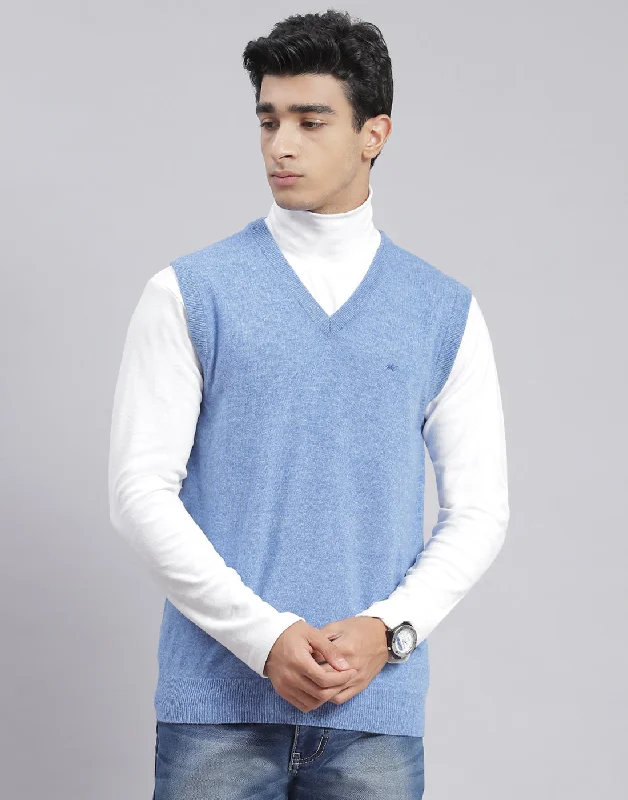 Get ready for the season with exclusive savings on trendy clothes.  Men Blue Solid V Neck Sleeveless Sweater