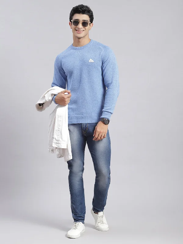 Enjoy exclusive discounts.  Men Blue Solid Round Neck Sweater