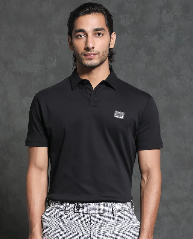 Shop stylish fashion – Get huge savings on men’s clothing. Rare Rabbit Men's Badger-1 Black Cotton Fabric Collared Neck Half Sleeves Solid Polo T-Shirt Shop stylish fashion – Get huge savings on men’s clothing. Rare Rabbit Men's Badger-1 Black Cotton Fabric Collared Neck Half Sleeves Solid Polo T-Shirt